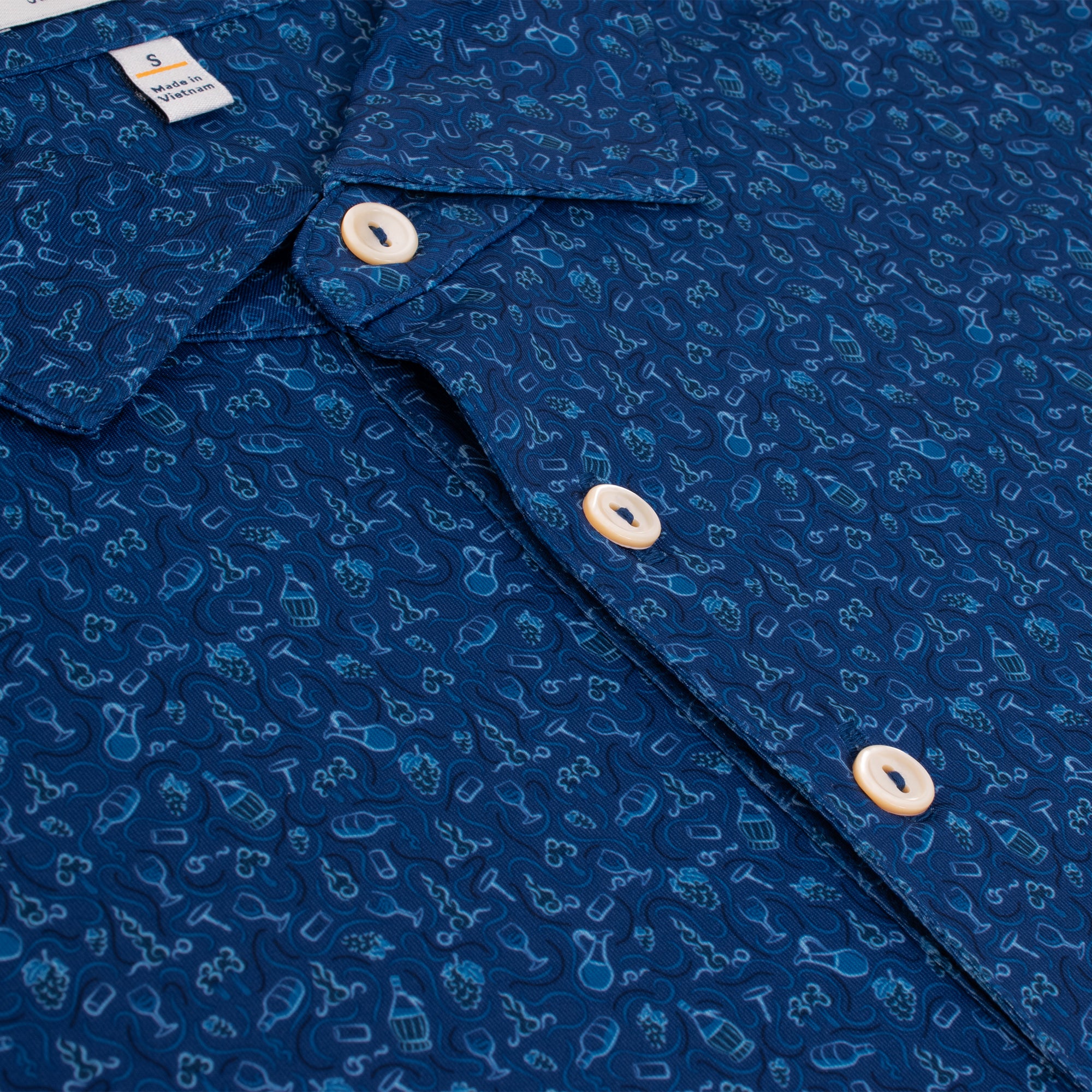 Close-up showing fabric pattern and buttons on Peter Millar Wine Country Polo – premium golf polo shirt for men